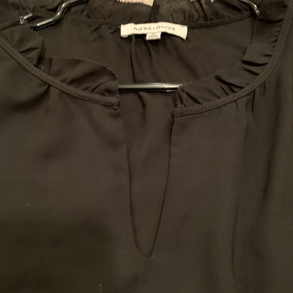Black sleeveless blouse